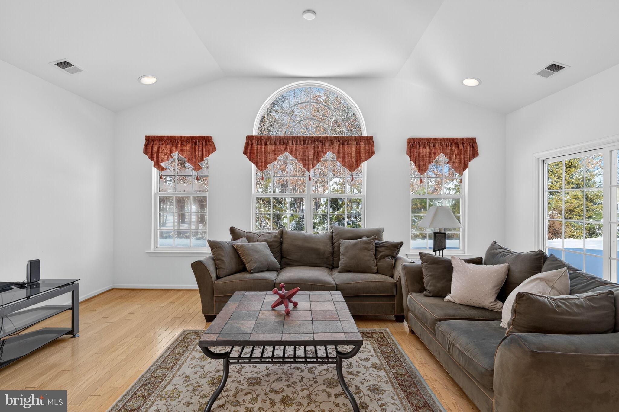 76 Portland Street Barnegat, NJ 08005 - Photo 27 of 47 a living room with furniture a rug and a window