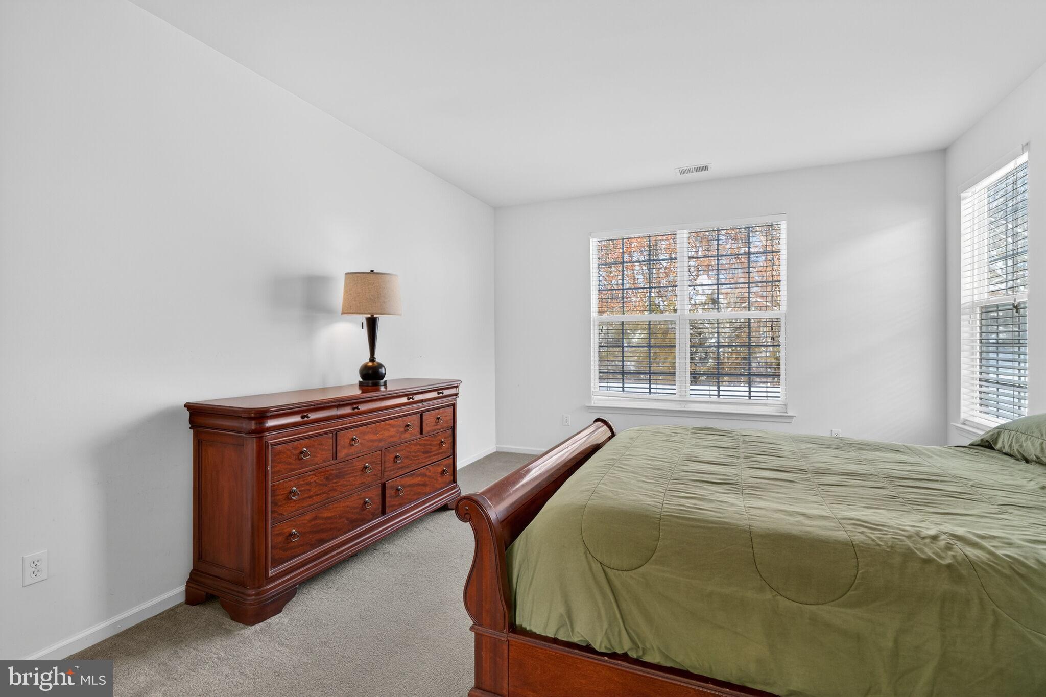 76 Portland Street Barnegat, NJ 08005 - Photo 30 of 47 a bedroom with a bed and window