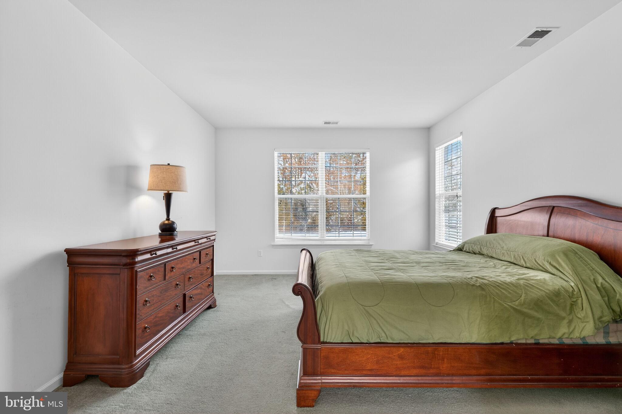 76 Portland Street Barnegat, NJ 08005 - Photo 31 of 47 a bedroom with a bed and window