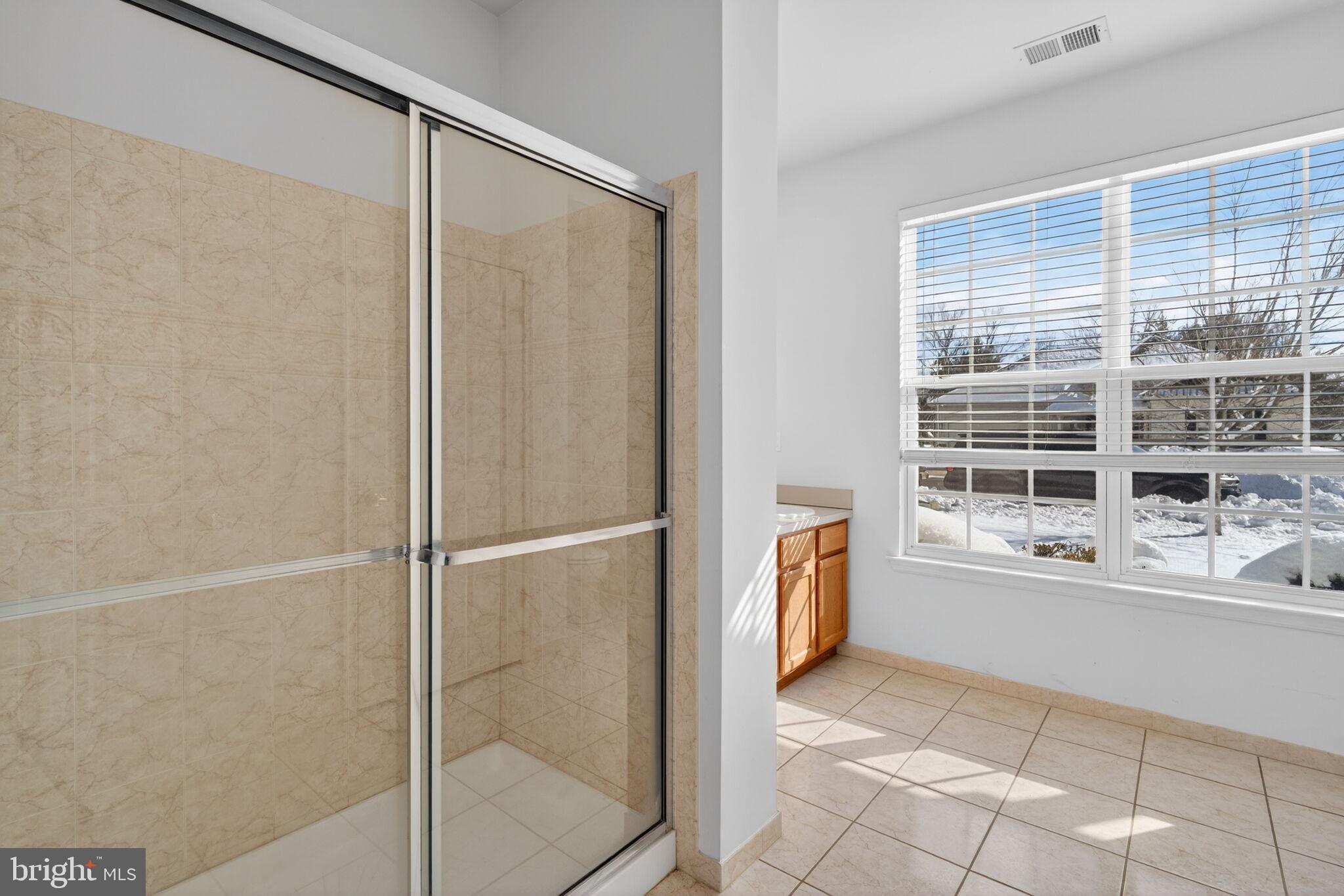 76 Portland Street Barnegat, NJ 08005 - Photo 36 of 47 a bathroom with a bathtub and a shower