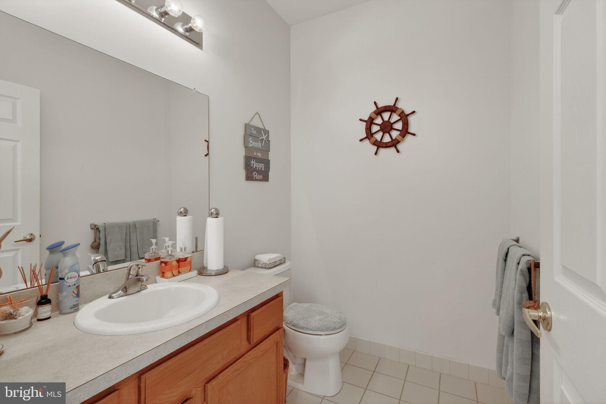 76 Portland Street Barnegat, NJ 08005 - Photo 39 of 47 a bathroom with a sink vanity mirror and toilet