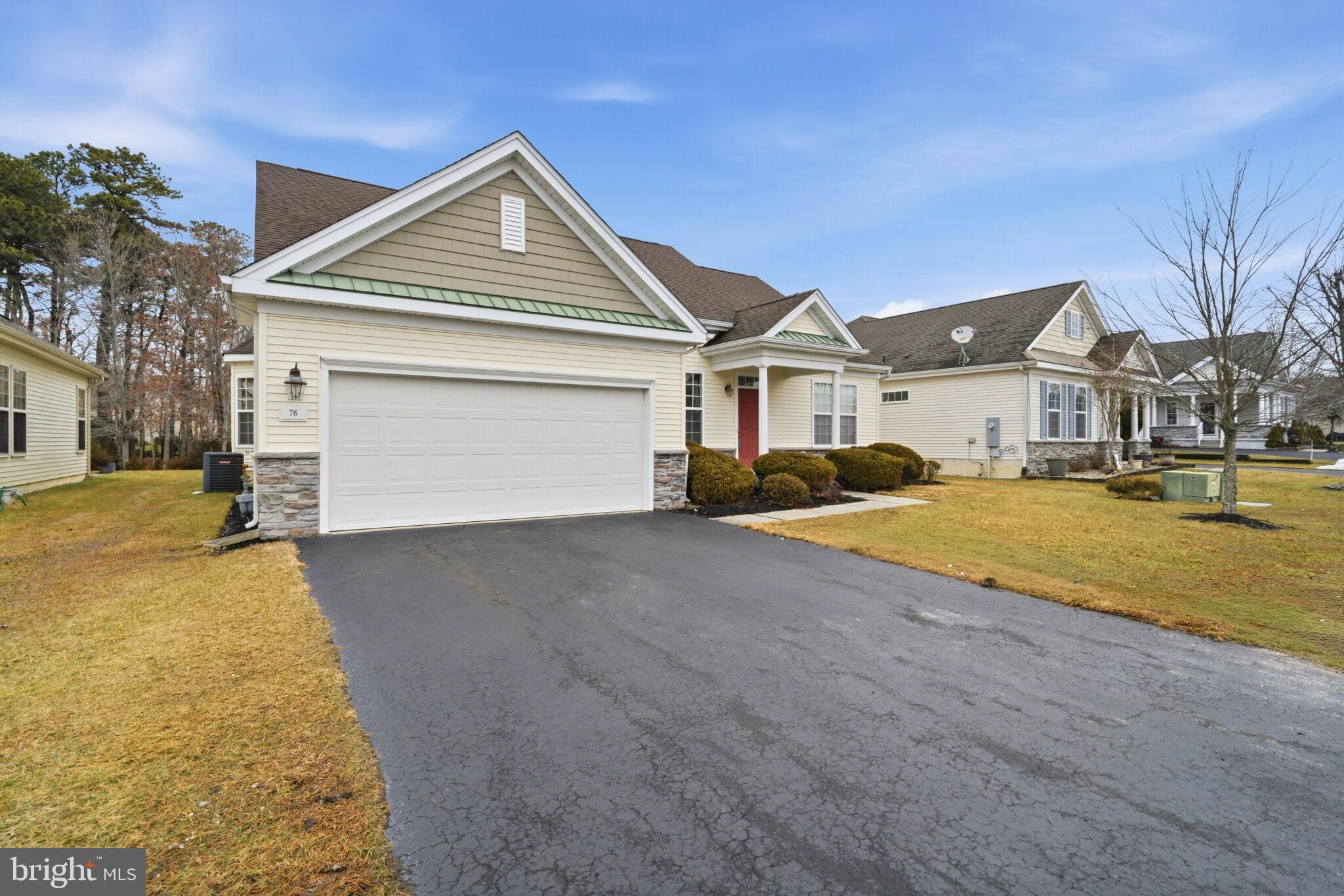76 Portland Street Barnegat, NJ 08005 - Photo 4 of 47 a front view of a house with a yard