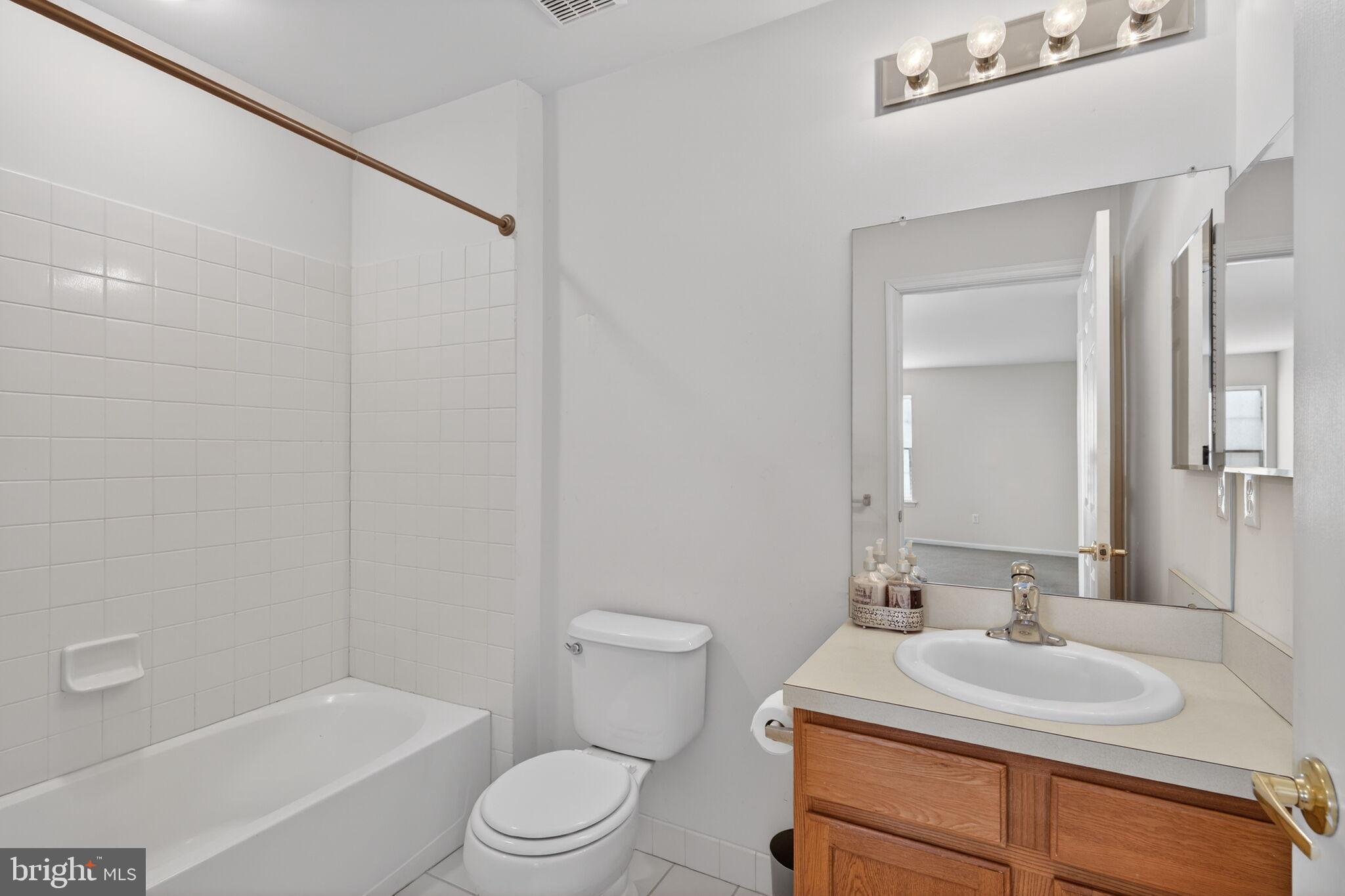 76 Portland Street Barnegat, NJ 08005 - Photo 45 of 47 a bathroom with a sink toilet and shower