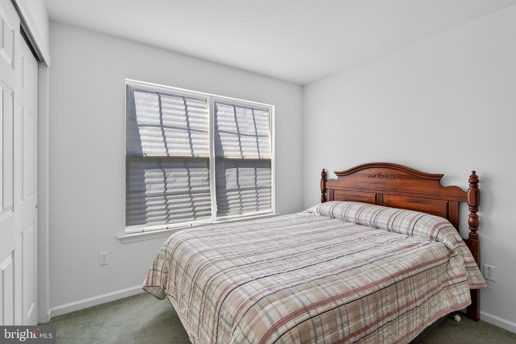 76 Portland Street Barnegat, NJ 08005 - Photo 47 of 47 a bedroom with a bed and a window