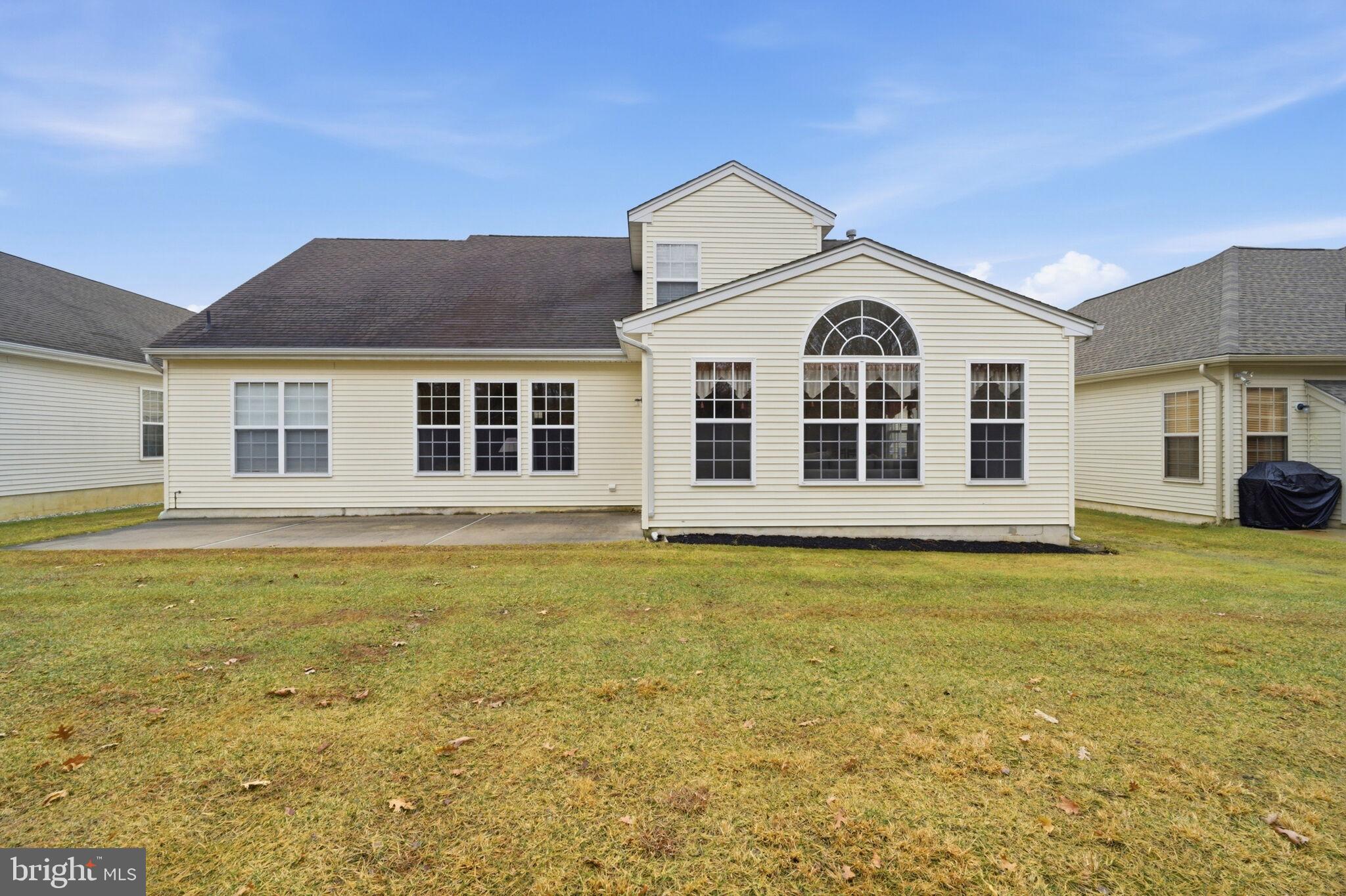 76 Portland Street Barnegat, NJ 08005 - Photo 7 of 47 a front view of a house with a garden