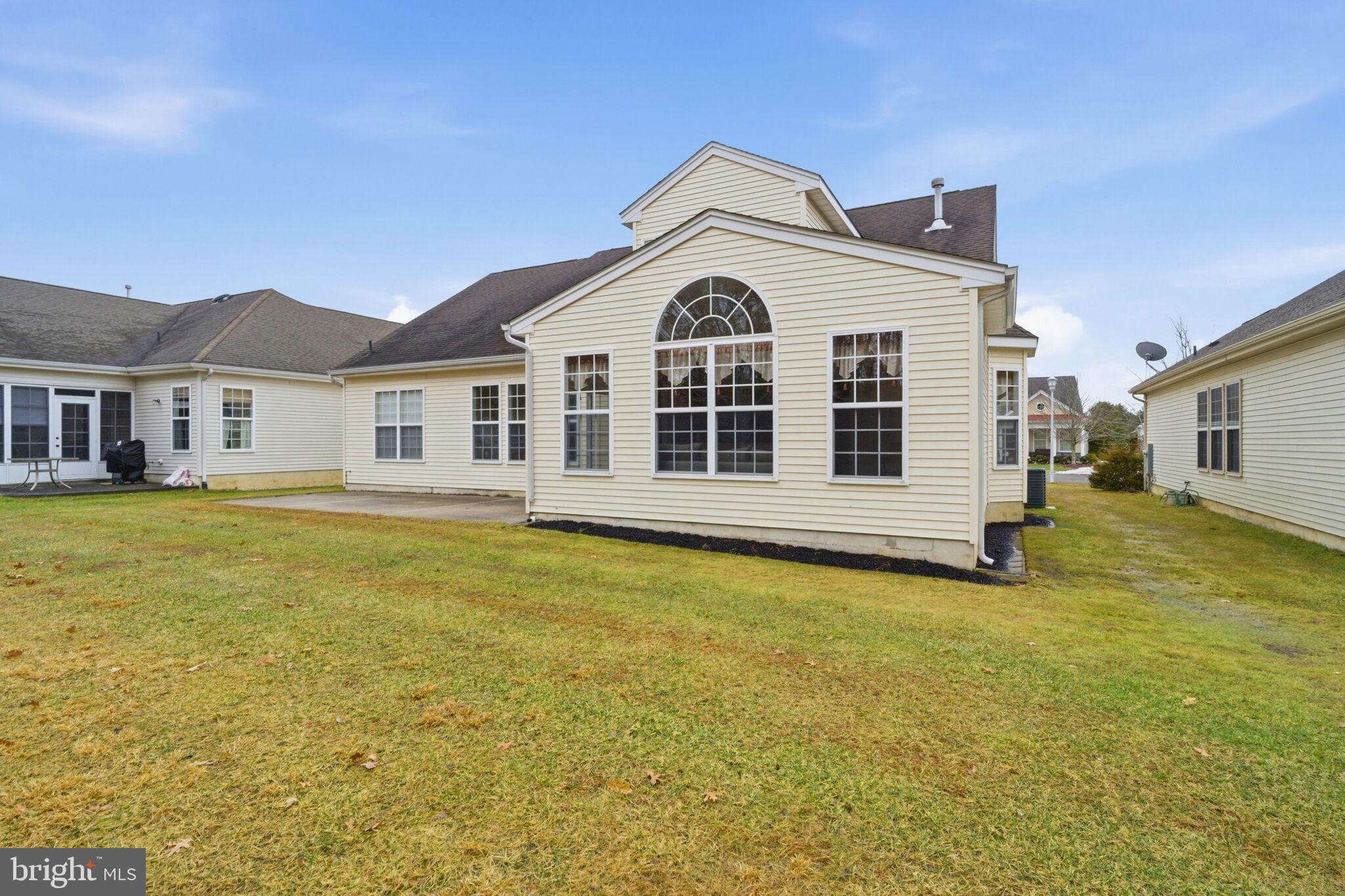76 Portland Street Barnegat, NJ 08005 - Photo 8 of 47 a front view of a house with a garden