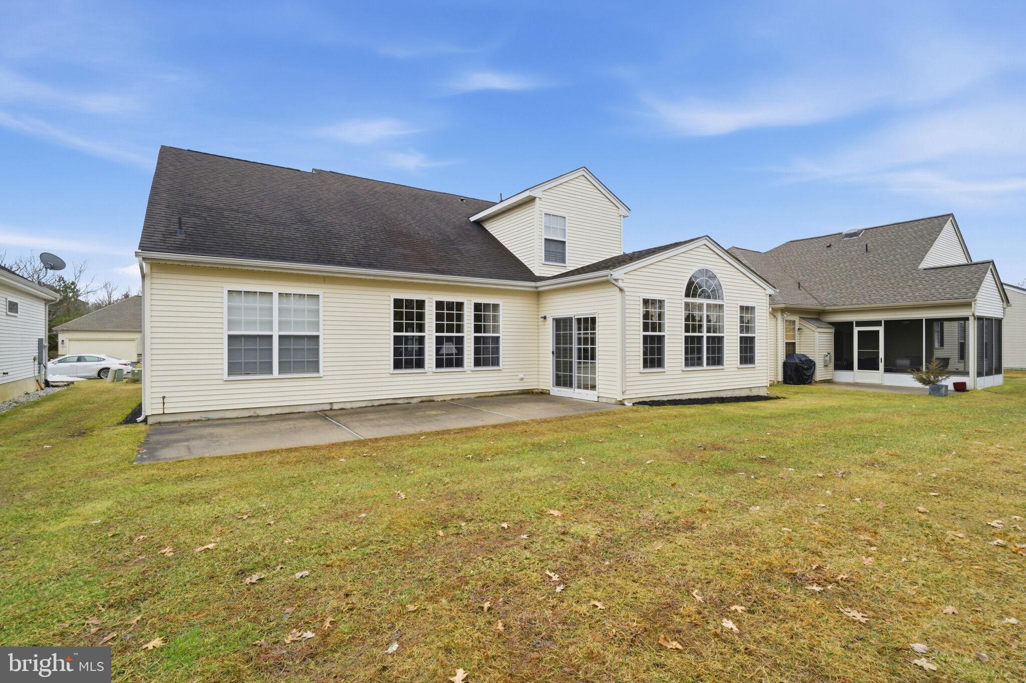 76 Portland Street Barnegat, NJ 08005 - Photo 9 of 47 a view of a house with a swimming pool