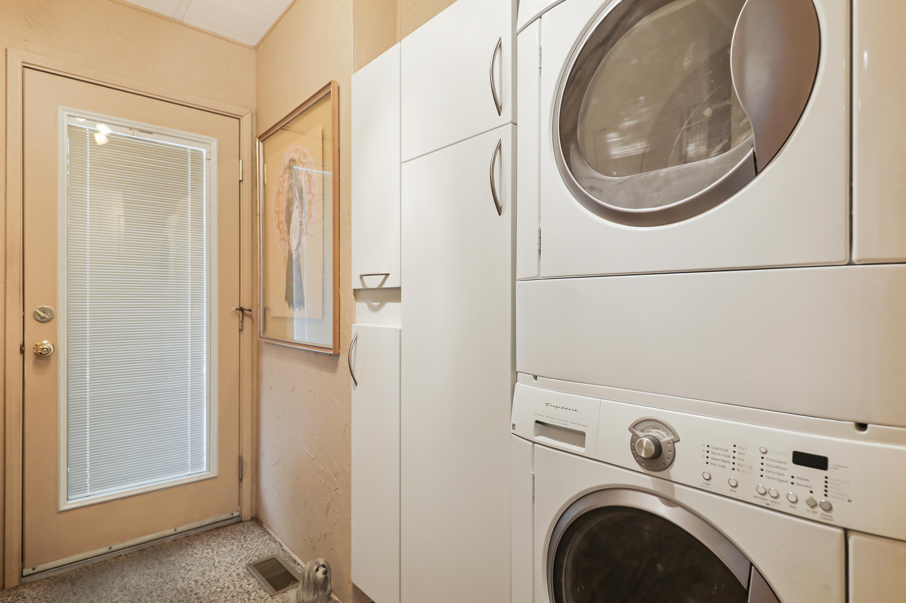 49305 Highway 74, Unit 86 Palm Desert, CA 92260 - Photo 16 of 31 a close up view of a washer and dryer