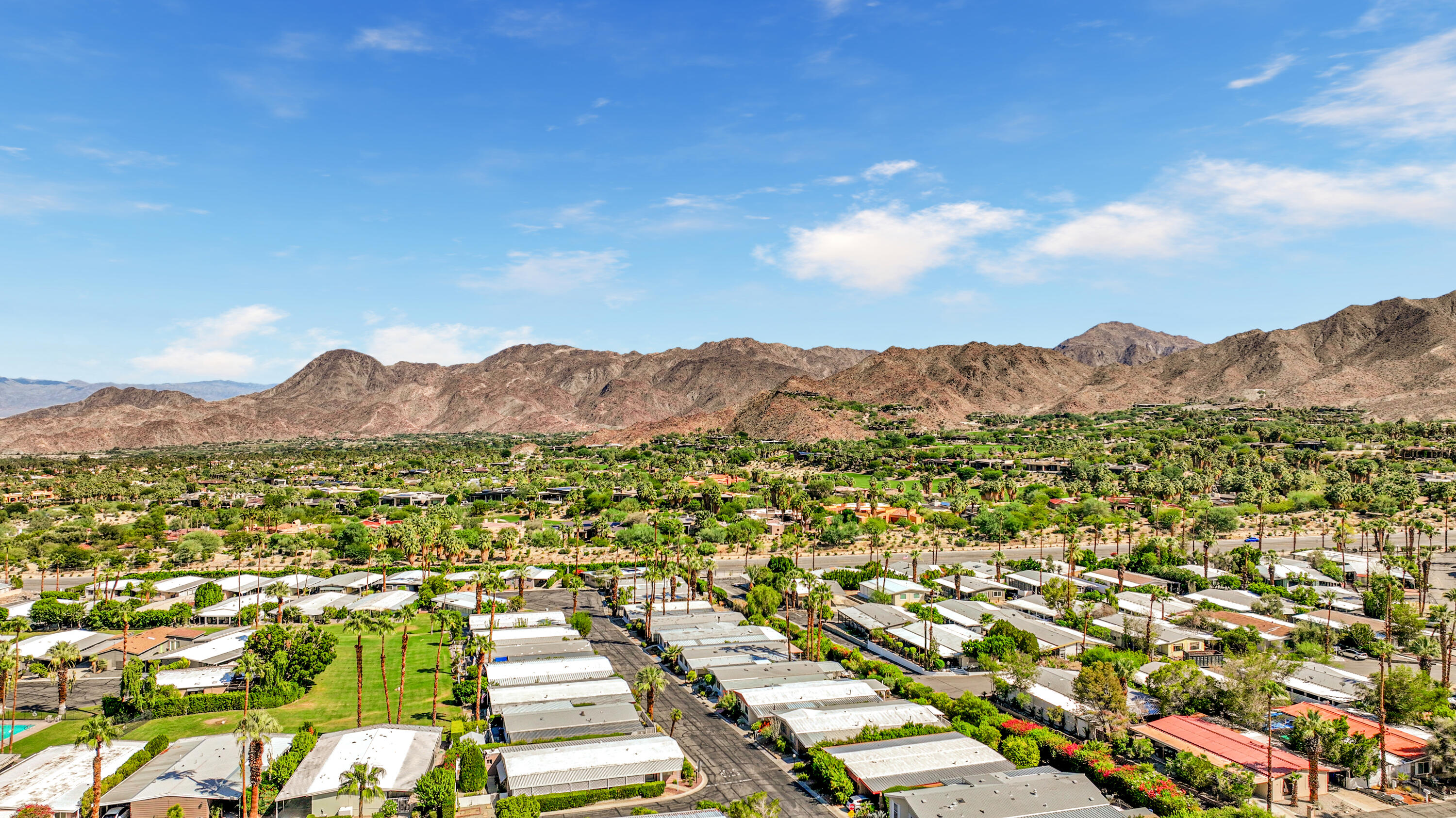 49305 Highway 74, Unit 86 Palm Desert, CA 92260 - Photo 28 of 31 a view of a city with mountain