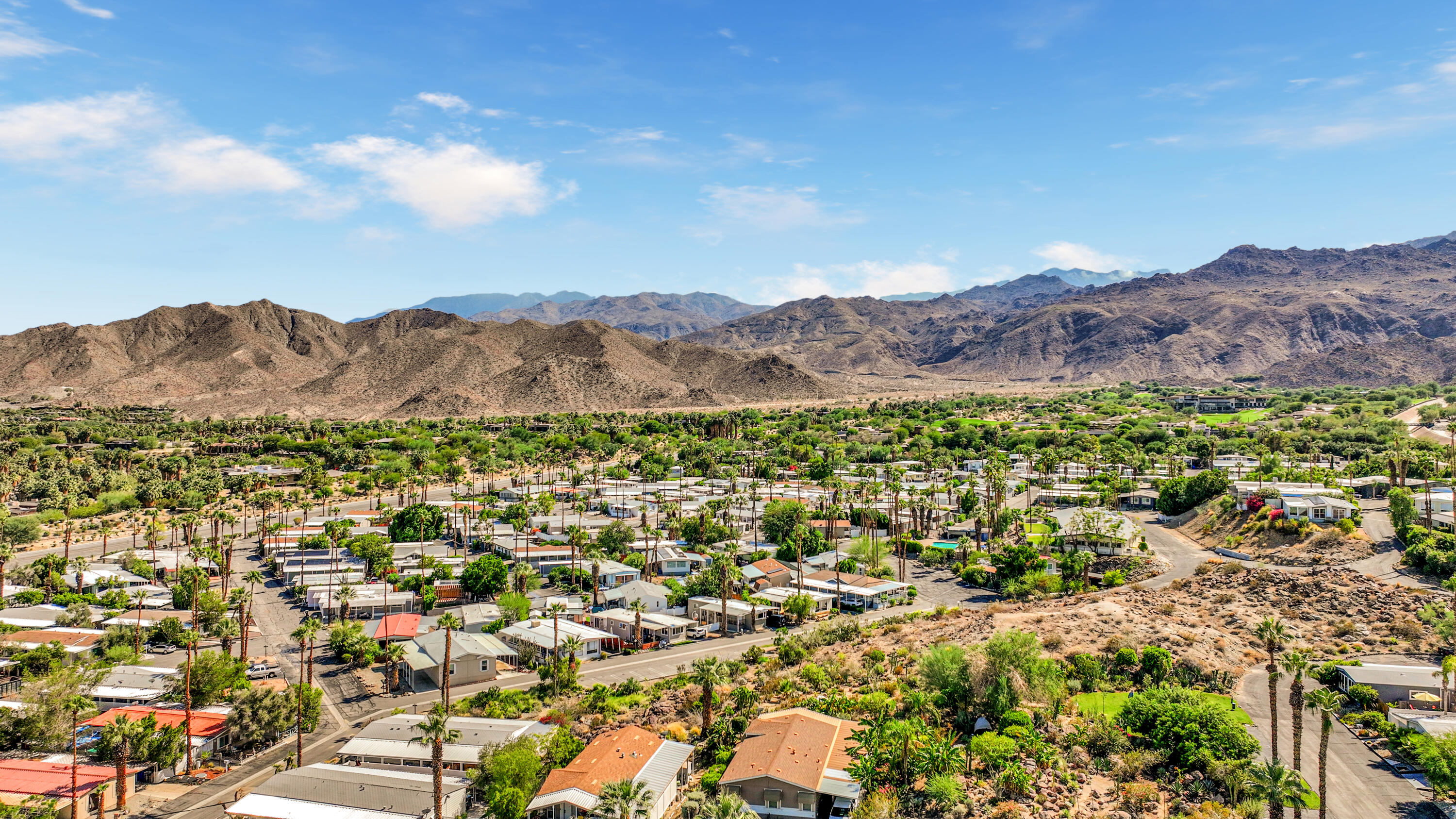 49305 Highway 74, Unit 86 Palm Desert, CA 92260 - Photo 29 of 31 an aerial view of residential house and green space