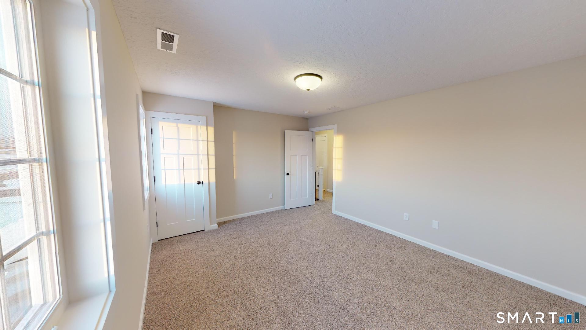 318 Capen Street Windsor, CT 06095 - Photo 11 of 30 a view of an empty room and a window