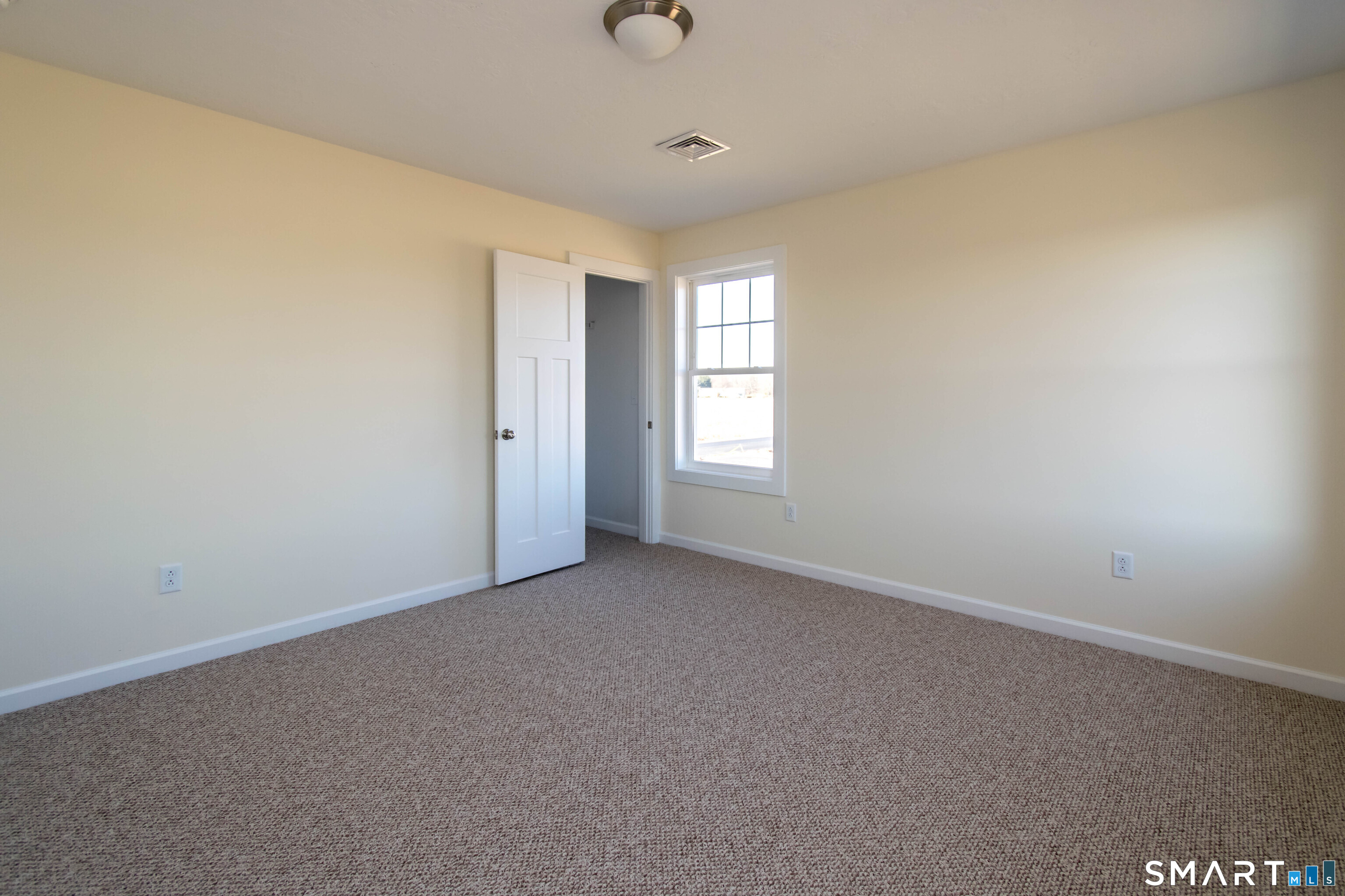 318 Capen Street Windsor, CT 06095 - Photo 14 of 30 an empty room with windows