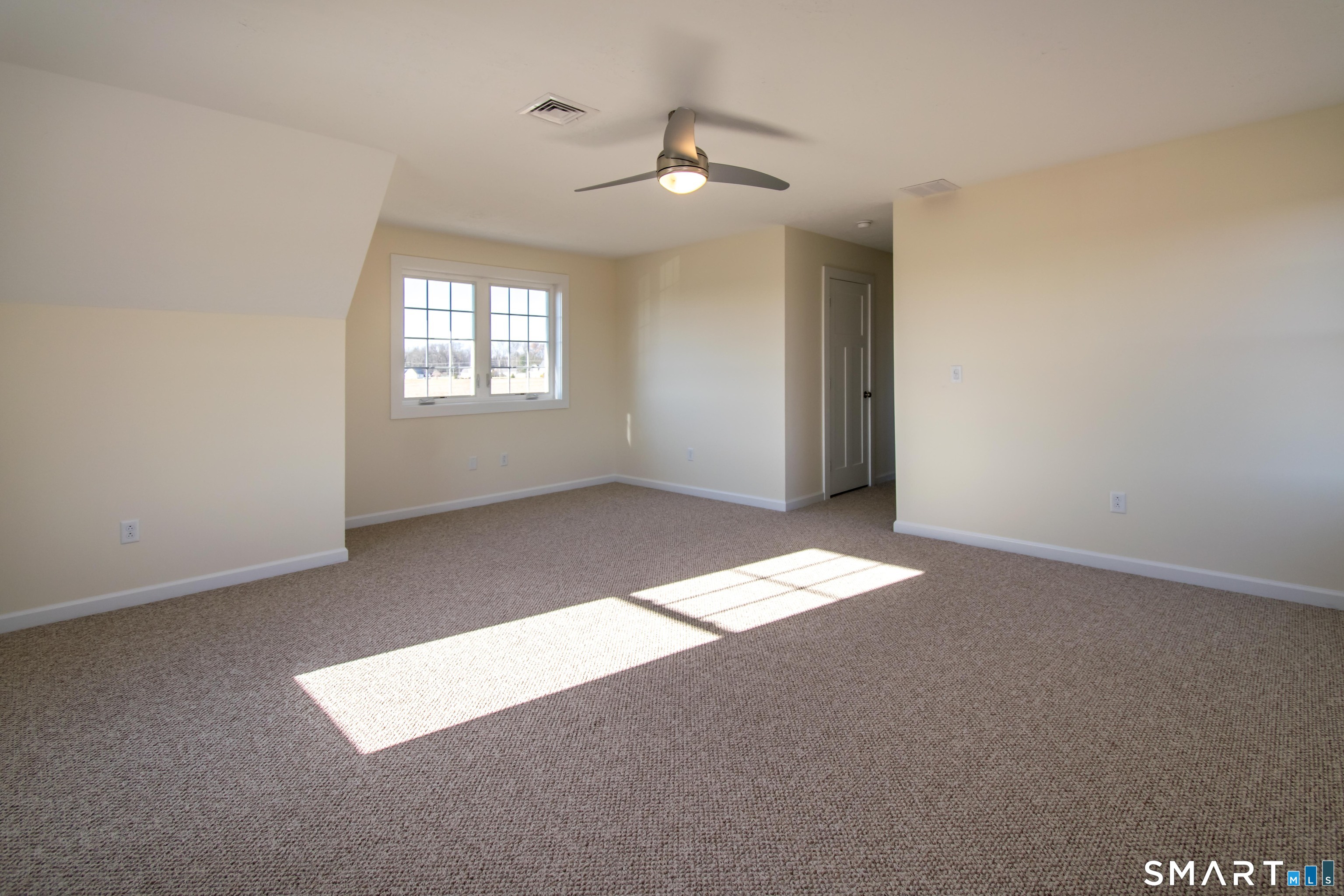 318 Capen Street Windsor, CT 06095 - Photo 28 of 30 an empty room with a ceiling fan and window