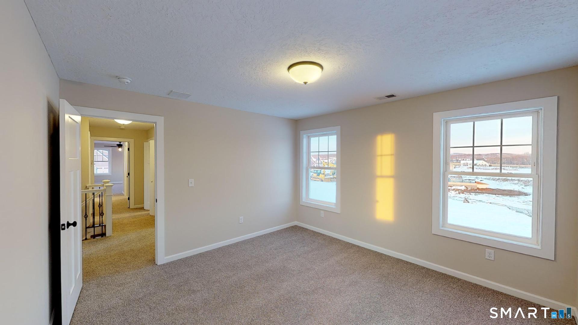 318 Capen Street Windsor, CT 06095 - Photo 10 of 30 a view of an empty room with a window