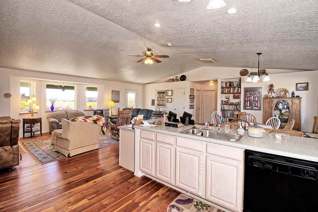 1515 19 Road Fruita, CO 81521 - Photo 28 of 42 a large room with lots of counter space and mirrors