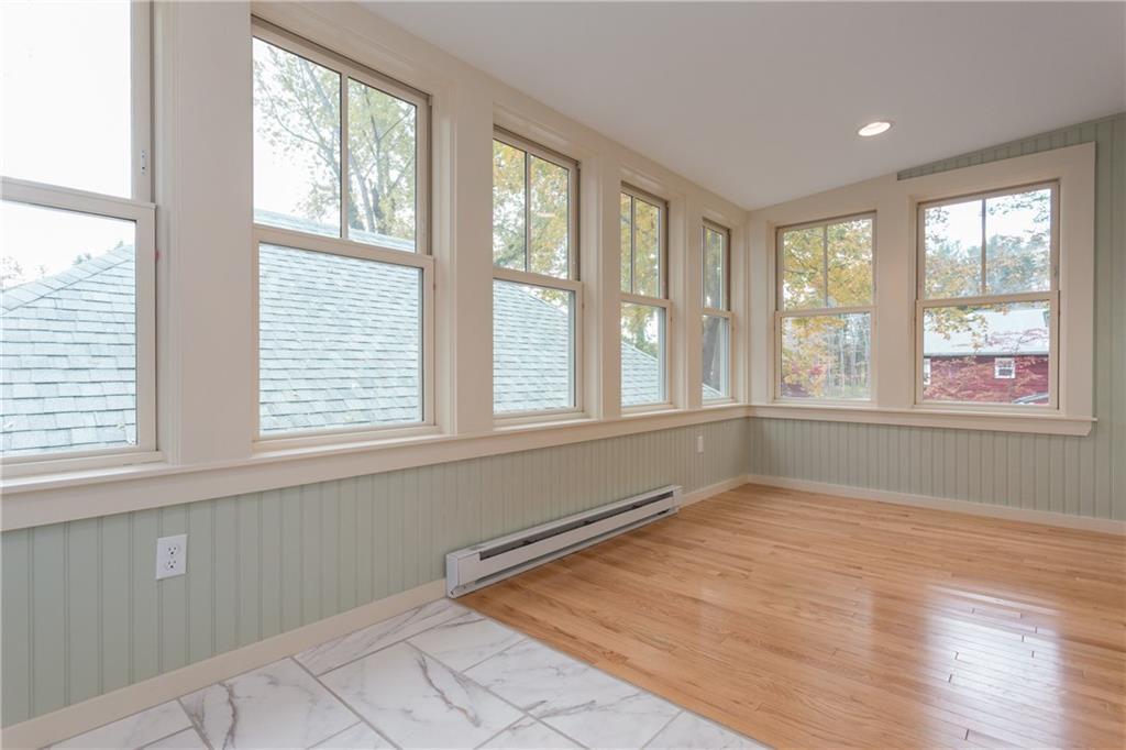 53 Long Sands Road York, ME 03909 - Photo 10 of 34 The sunroom has tile by the entry...