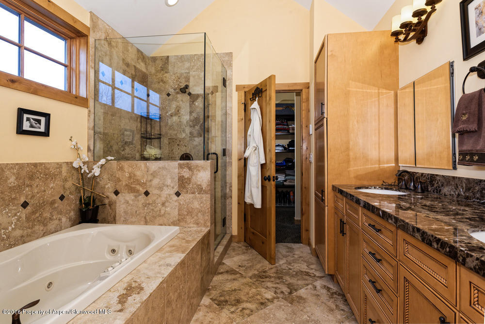 344 Sopris Circle Basalt, CO 81621 - Photo 13 of 31 a bathroom with a bathtub and a sink