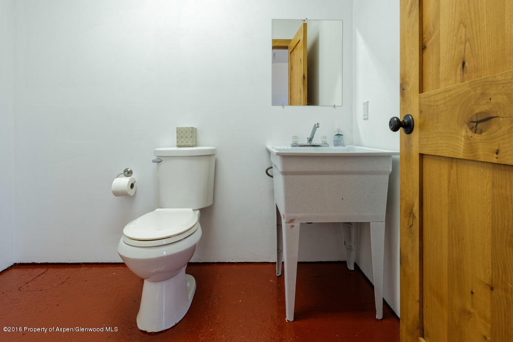 344 Sopris Circle Basalt, CO 81621 - Photo 19 of 31 a bathroom with a toilet and a sink