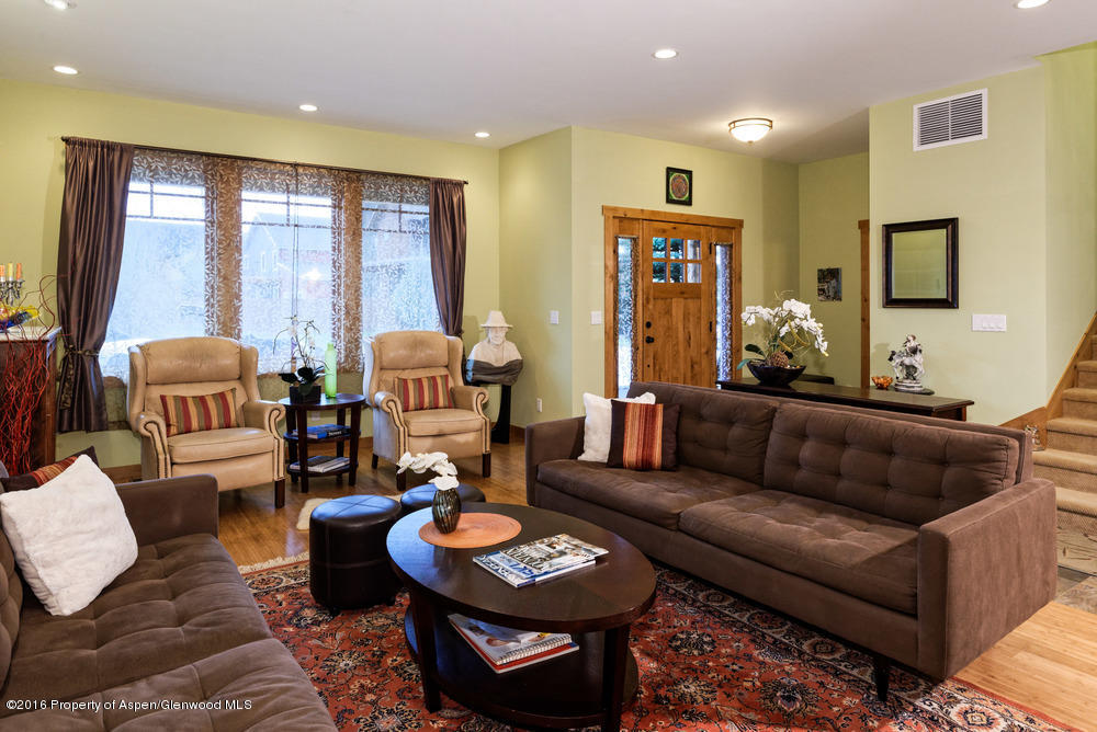 344 Sopris Circle Basalt, CO 81621 - Photo 2 of 31 a living room with furniture and a large window