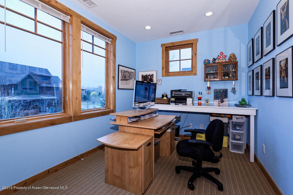 344 Sopris Circle Basalt, CO 81621 - Photo 21 of 31 a room with furniture a rug and a window