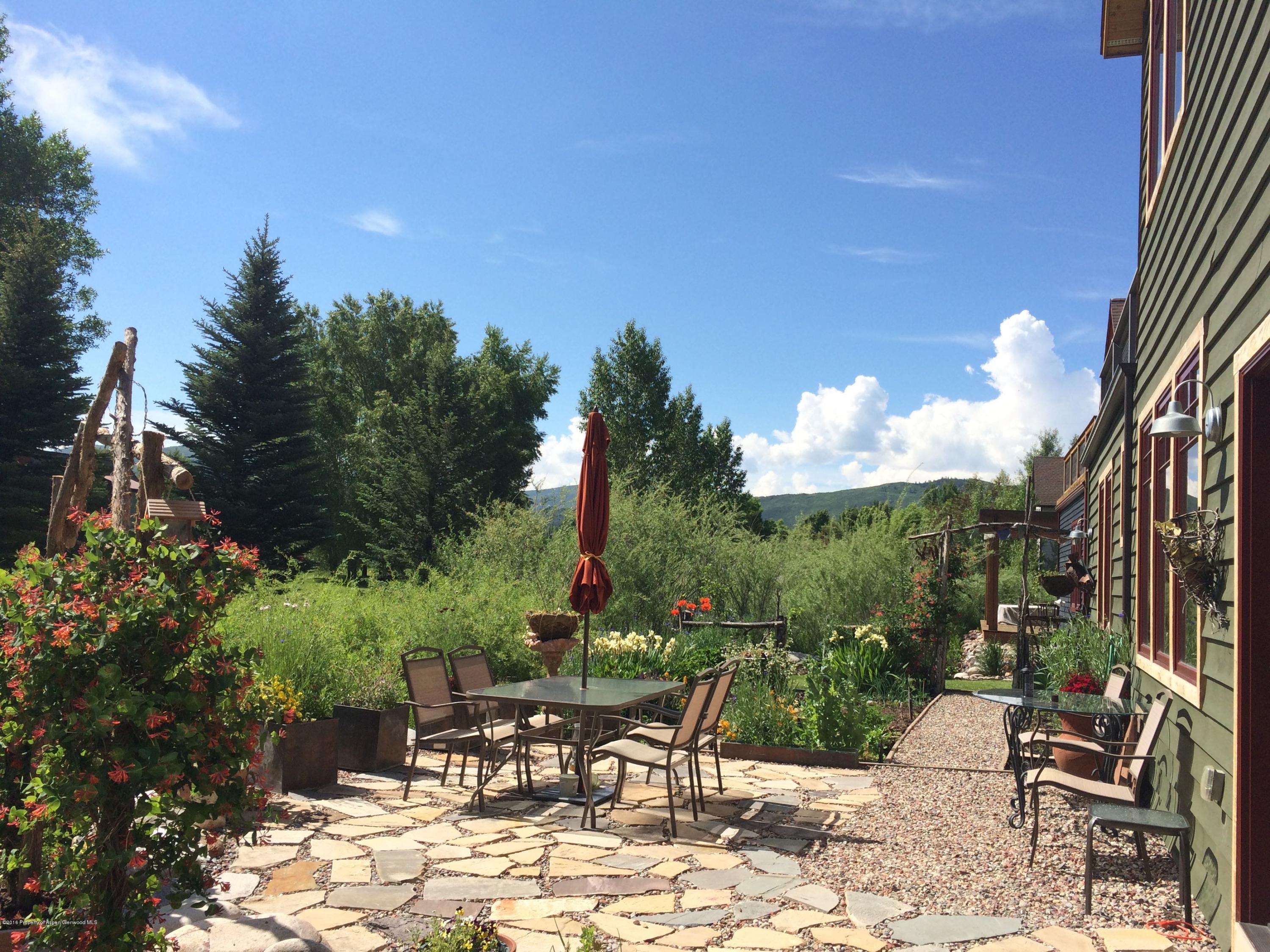 344 Sopris Circle Basalt, CO 81621 - Photo 28 of 31 a view of a tables and chairs in patio