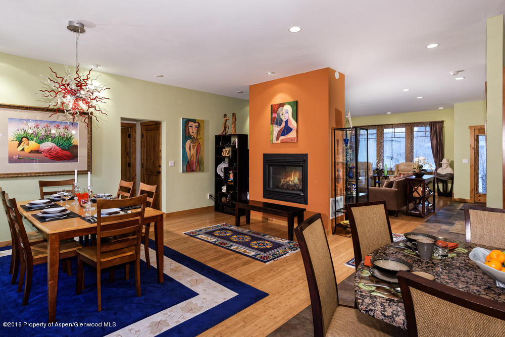 344 Sopris Circle Basalt, CO 81621 - Photo 5 of 31 a living room with furniture a rug and a fireplace