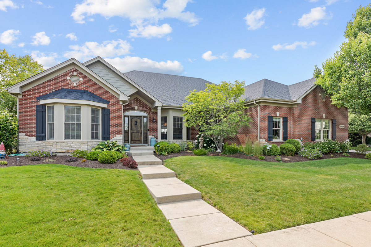 S096 Catlin Square Geneva, IL 60134 - Photo 1 of 1 a front view of a house with a yard