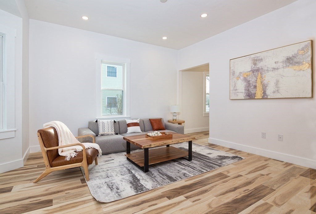 84 Dudley Street Medford, MA 02155 - Photo 3 of 27 a living room with furniture rug and window