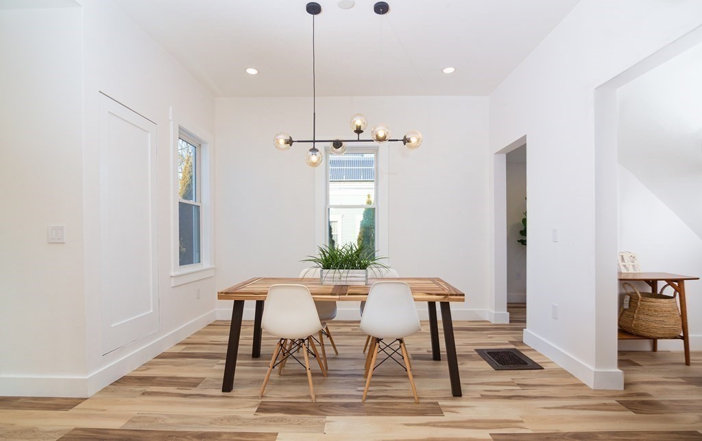 84 Dudley Street Medford, MA 02155 - Photo 10 of 27 a view of a dining room with furniture window and wooden floor