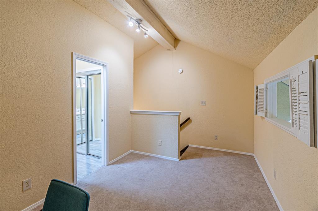 5590 Spring Valley Road, Unit C205 Dallas, TX 75254 - Photo 18 of 25 Upstairs bedroom/office