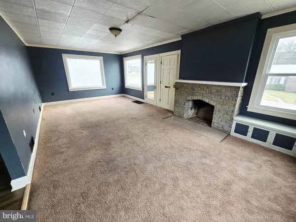an empty room with windows