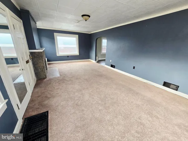 a view of a livingroom with a fireplace