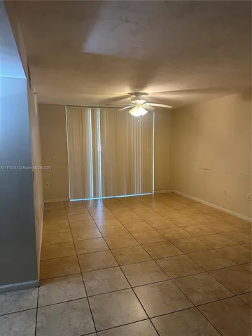 a view of a house with a street