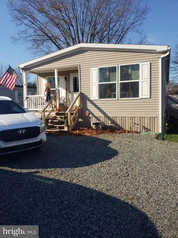 a front view of a house with porch