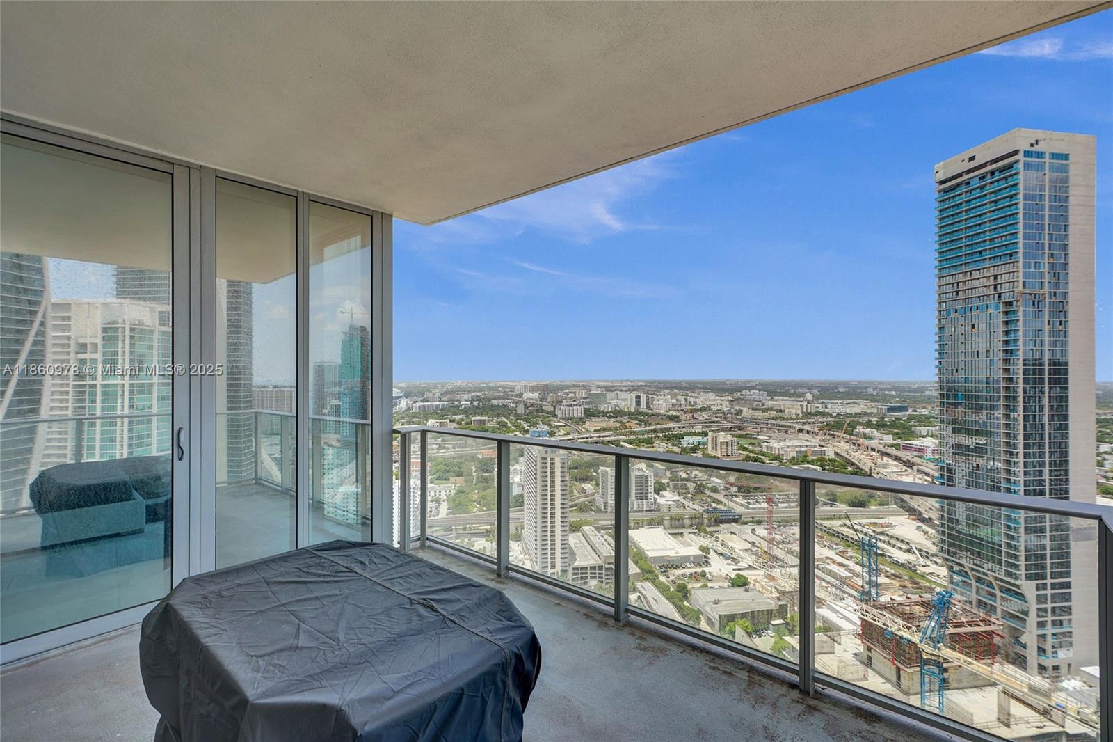 851 Northeast 1st Avenue, Unit 3800 Miami, FL 33132 - Photo 16 of 29 a view of a balcony with an outdoor space