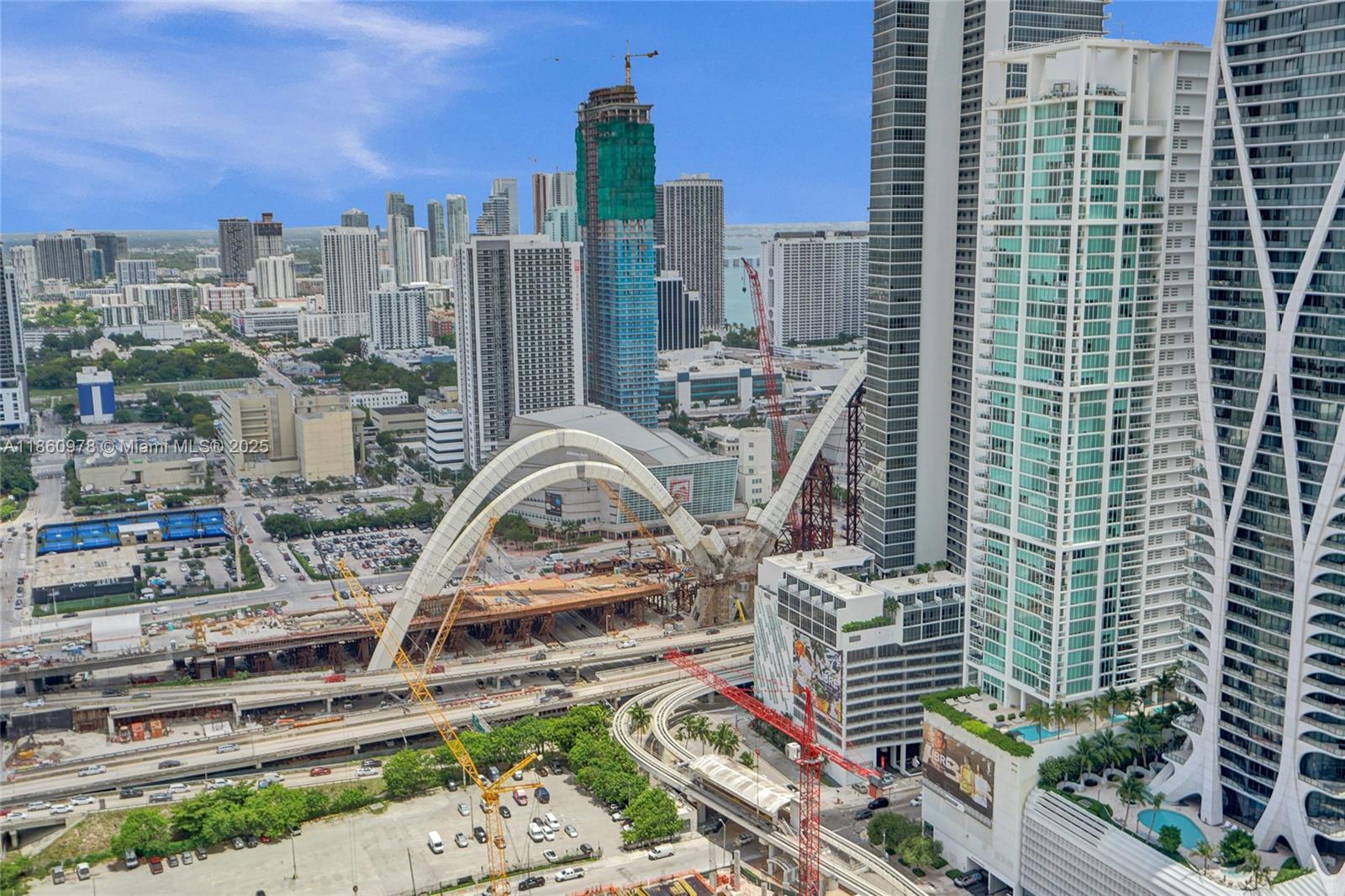 851 Northeast 1st Avenue, Unit 3800 Miami, FL 33132 - Photo 21 of 29 a view of a city with tall buildings