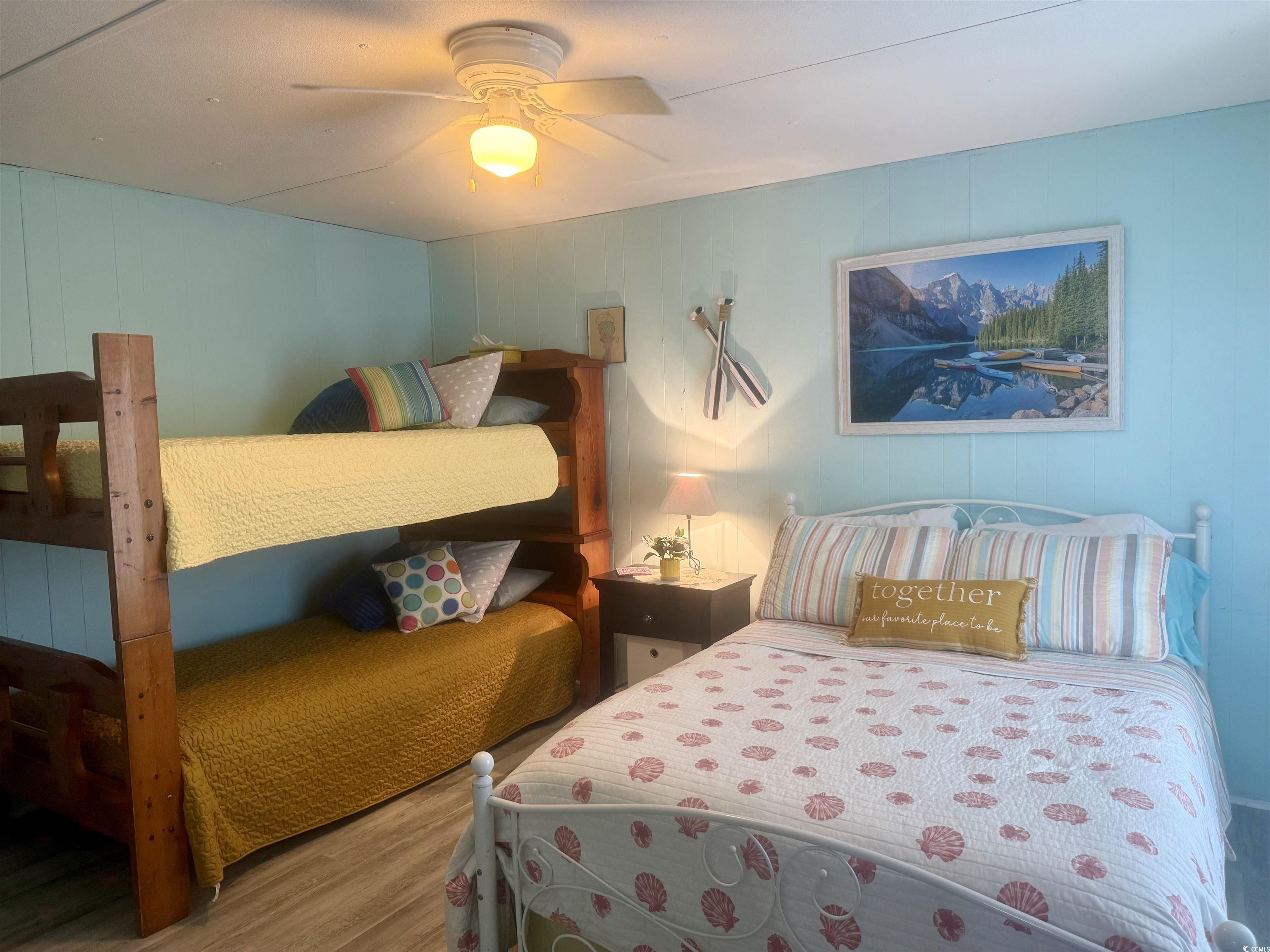 1672 Falcon Surfside Beach, SC 29575 - Photo 15 of 26 Bedroom with wood finished floors and a ceiling fan