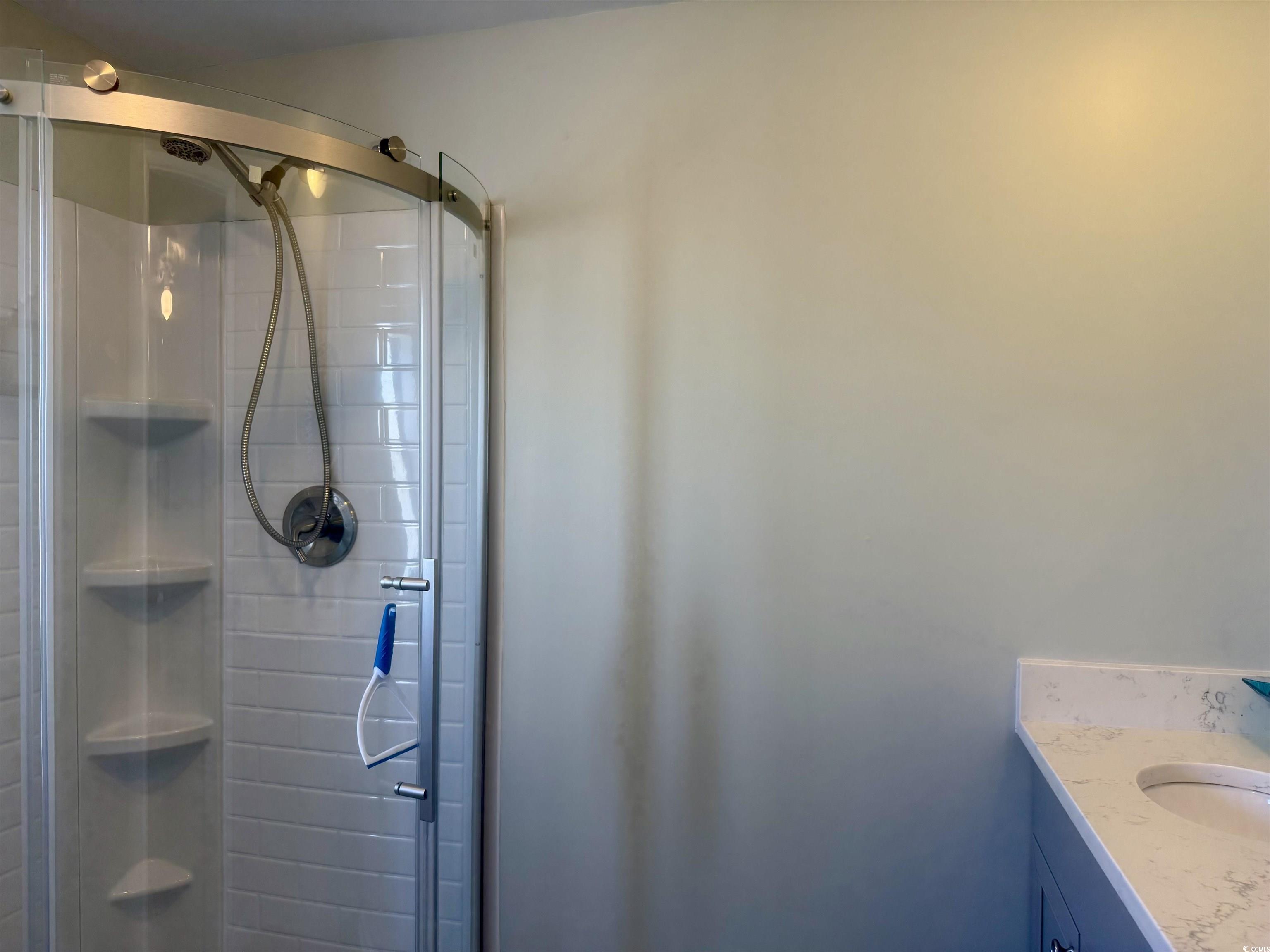 1672 Falcon Surfside Beach, SC 29575 - Photo 8 of 26 Full bathroom featuring a stall shower and vanity