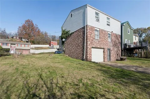 a house view with a outdoor space