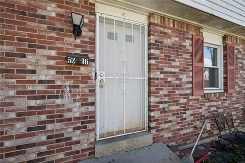 a brick building with a window