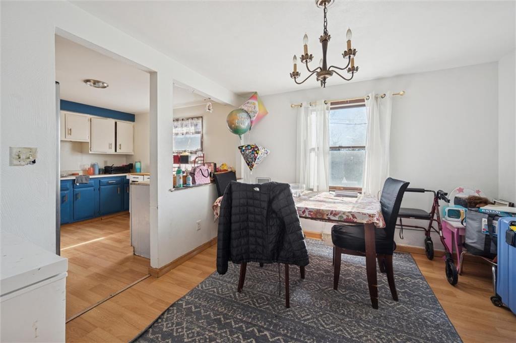 5216 Broad Street Pittsburgh, PA 15224 - Photo 8 of 32 a view of a dining room with furniture window and wooden floor