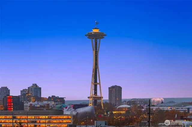 a front view of a building with a city view