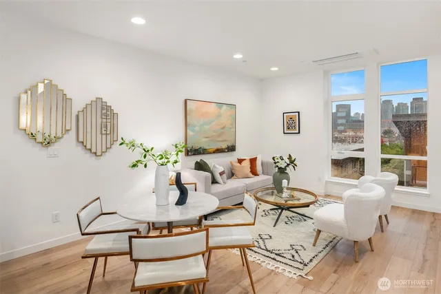 a living room with furniture and a table