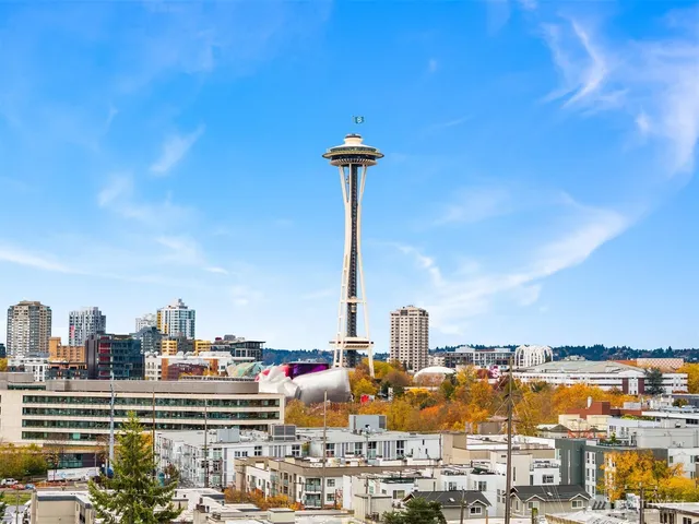a view of a city with tall buildings