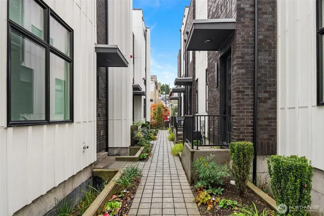 a view of many windows and a fire pit