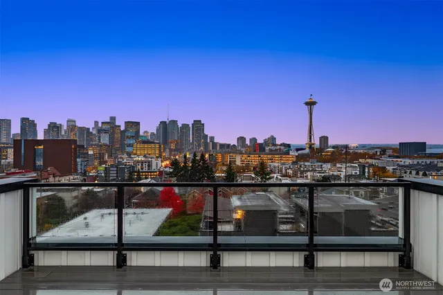 a view of a city skyline from a balcony