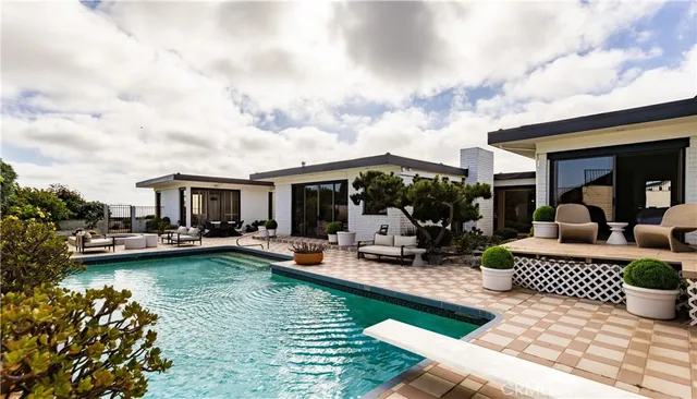 a view of a house patio and yard