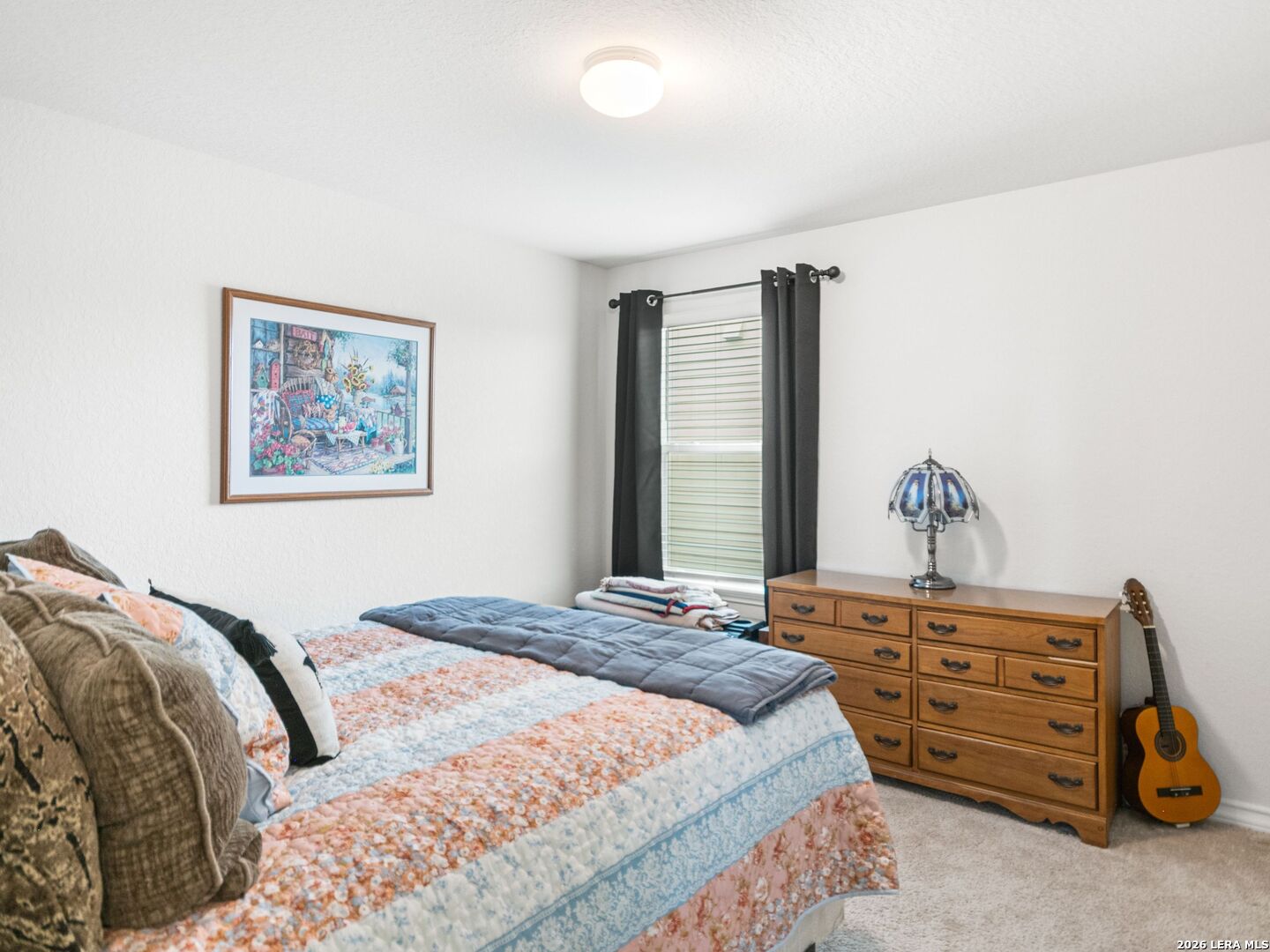 432 Salt Fork Cibolo, TX 78108 - Photo 14 of 19 a bedroom with a bed and a window