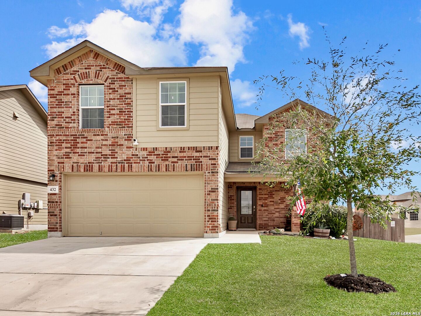 432 Salt Fork Cibolo, TX 78108 - Photo 2 of 19 a front view of a house with a garden and yard