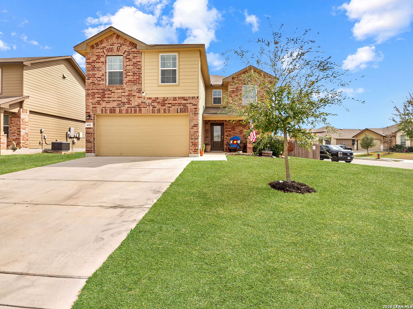 432 Salt Fork Cibolo, TX 78108 - Photo 3 of 19 a front view of a house with a garden and tree